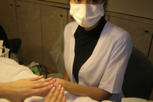 Manicurist Wearing Mask