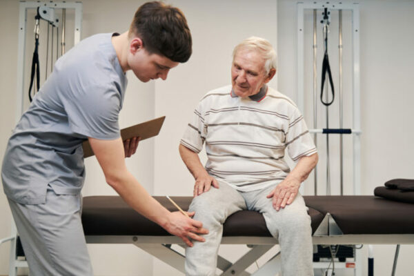 Physical Therapist and Patient